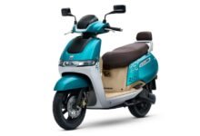 TVS iQube MillionR Special Edition electric scooter in Aurora Green dual-tone colour